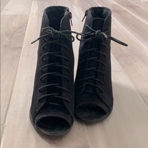 Heeled laced booties.